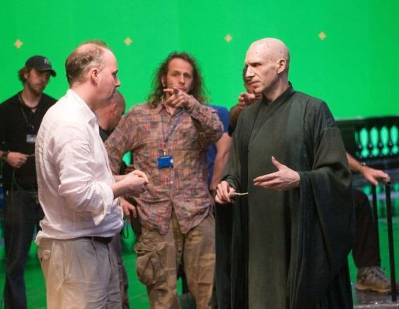 Ralph Fiennes behind the scenes of ‘Harry Potter’ in costume as Lord Voldemort. 